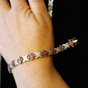 Gold over sterling ruby tennis bracelet 8"